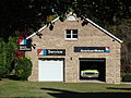 "Dream" garage in backyard with vintage AMC collectibles.jpg