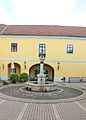 Fountain with pelican by the Town Museum of Gödöllő.jpg