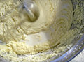 Beating milk into cake mixture.JPG